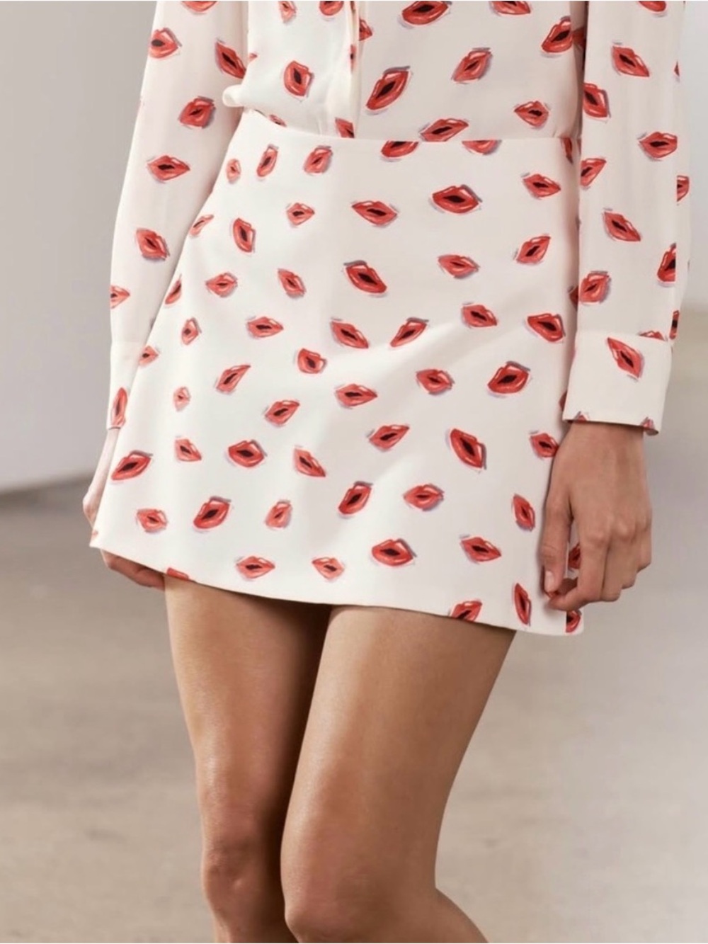 Zara Cream Mini Skirt with Red Lip Print